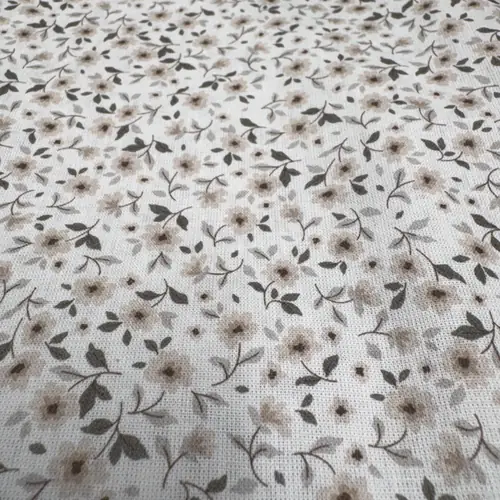 Tela florecitas crudo